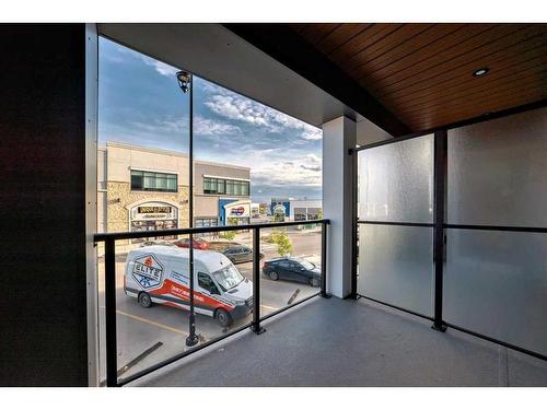 2219-681 Savanna Boulevard, Calgary, AB - Outdoor With Balcony With Exterior