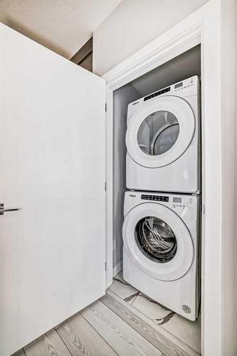 2219-681 Savanna Boulevard, Calgary, AB - Indoor Photo Showing Laundry Room