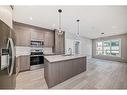 2219-681 Savanna Boulevard, Calgary, AB  - Indoor Photo Showing Kitchen With Stainless Steel Kitchen With Upgraded Kitchen 