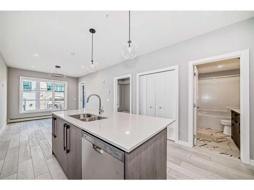 2219-681 Savanna Boulevard, Calgary, AB - Indoor Photo Showing Kitchen With Double Sink With Upgraded Kitchen