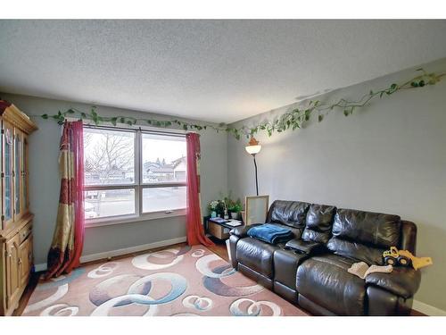 144 Whitmire Road Ne, Calgary, AB - Indoor Photo Showing Living Room