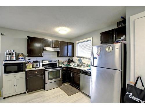 144 Whitmire Road Ne, Calgary, AB - Indoor Photo Showing Kitchen