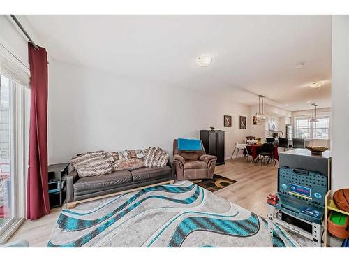 97 Copperstone Road Se, Calgary, AB - Indoor Photo Showing Living Room