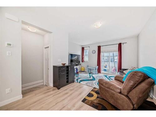 97 Copperstone Road Se, Calgary, AB - Indoor Photo Showing Living Room