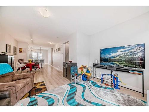 97 Copperstone Road Se, Calgary, AB - Indoor Photo Showing Living Room