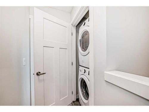 97 Copperstone Road Se, Calgary, AB - Indoor Photo Showing Laundry Room