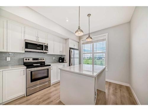 97 Copperstone Road Se, Calgary, AB - Indoor Photo Showing Kitchen With Upgraded Kitchen