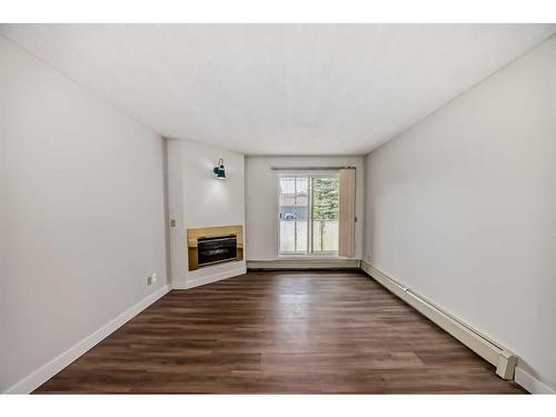 12-2712 Edenwold Heights Nw, Calgary, AB - Indoor With Fireplace