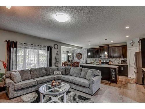 182 Sherwood Mount Nw, Calgary, AB - Indoor Photo Showing Living Room