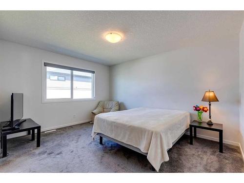 78 Harvest Grove Common Ne, Calgary, AB - Indoor Photo Showing Bedroom