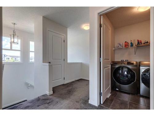 78 Harvest Grove Common Ne, Calgary, AB - Indoor Photo Showing Laundry Room