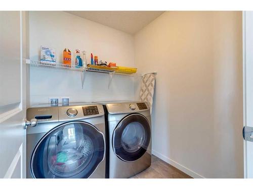 78 Harvest Grove Common Ne, Calgary, AB - Indoor Photo Showing Laundry Room