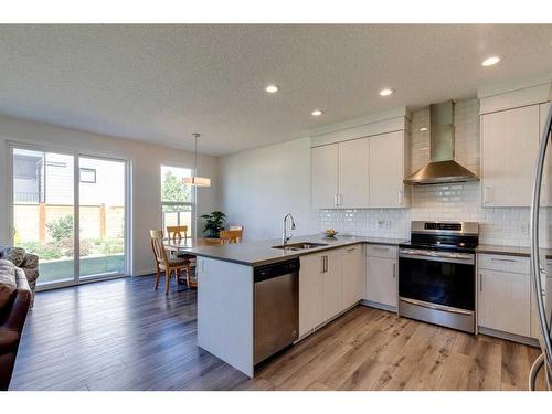 78 Harvest Grove Common Ne, Calgary, AB - Indoor Photo Showing Kitchen With Upgraded Kitchen