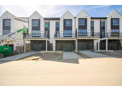 249 Sovereign Common Sw, Calgary, AB - Outdoor With Balcony With Facade