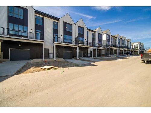 249 Sovereign Common Sw, Calgary, AB - Outdoor With Balcony With Facade