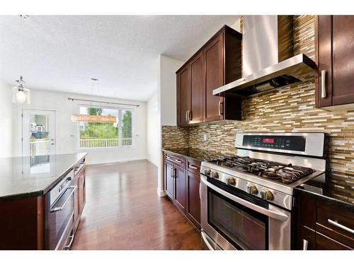 406 Silverado Way Sw, Calgary, AB - Indoor Photo Showing Kitchen With Stainless Steel Kitchen With Upgraded Kitchen