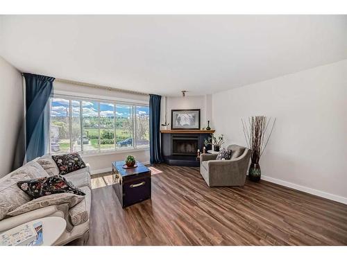 1803 /1805 41 Street Nw, Calgary, AB - Indoor Photo Showing Living Room With Fireplace