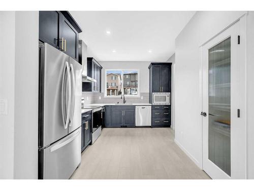 63 Marmot Way Nw, Calgary, AB - Indoor Photo Showing Kitchen