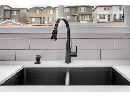 63 Marmot Way Nw, Calgary, AB - Indoor Photo Showing Kitchen With Double Sink
