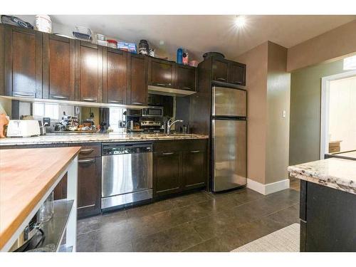 202-1822 17 Street Sw, Calgary, AB - Indoor Photo Showing Kitchen With Stainless Steel Kitchen