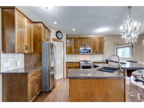 439 Cranfield Gardens Se, Calgary, AB - Indoor Photo Showing Kitchen With Double Sink