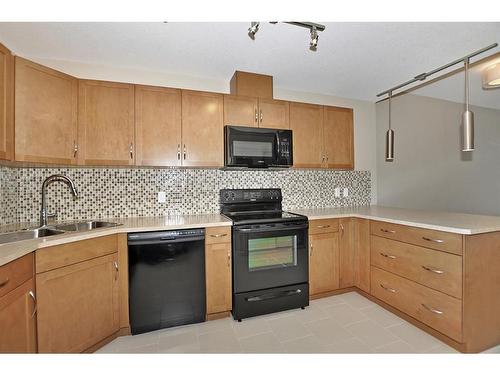 2006-1320 1 Street Se, Calgary, AB - Indoor Photo Showing Kitchen With Double Sink