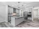 157 Belmont Villas Sw, Calgary, AB  - Indoor Photo Showing Kitchen With Stainless Steel Kitchen With Upgraded Kitchen 