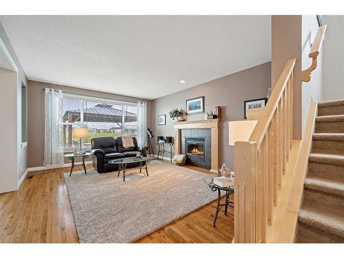 134 Copperstone Close Se, Calgary, AB - Indoor With Fireplace