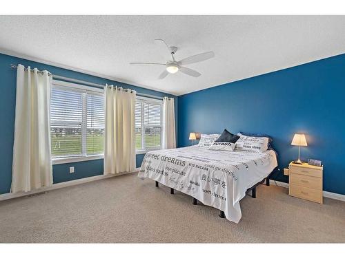 134 Copperstone Close Se, Calgary, AB - Indoor Photo Showing Bedroom