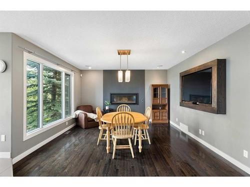 1396 Shawnee Road Sw, Calgary, AB - Indoor With Fireplace