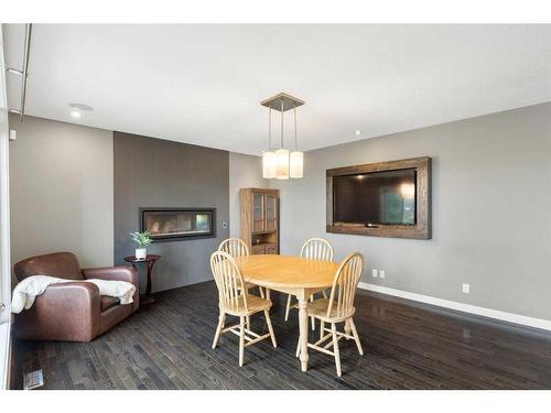 1396 Shawnee Road Sw, Calgary, AB - Indoor With Fireplace