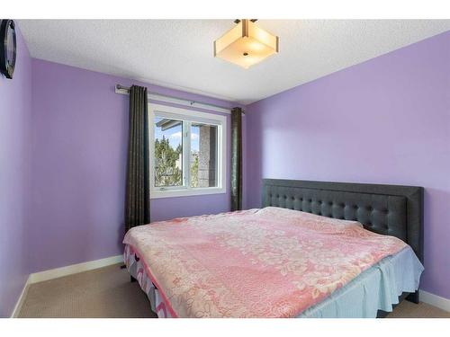 1396 Shawnee Road Sw, Calgary, AB - Indoor Photo Showing Bedroom