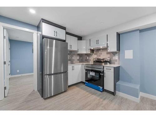 1940 Cottonwood Crescent Se, Calgary, AB - Indoor Photo Showing Kitchen With Stainless Steel Kitchen