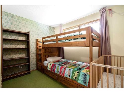 370100 272 Street West, Rural Foothills County, AB - Indoor Photo Showing Bedroom