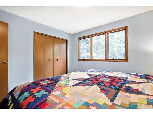 370100 272 Street West, Rural Foothills County, AB - Indoor Photo Showing Bedroom