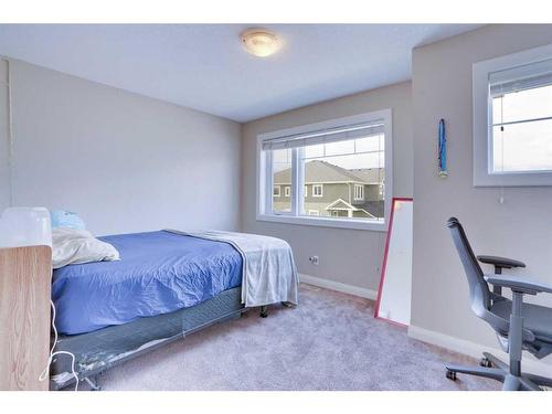 33 Redstone Villas Ne, Calgary, AB - Indoor Photo Showing Bedroom
