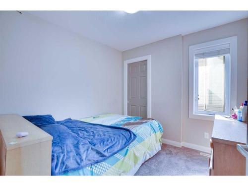 33 Redstone Villas Ne, Calgary, AB - Indoor Photo Showing Bedroom