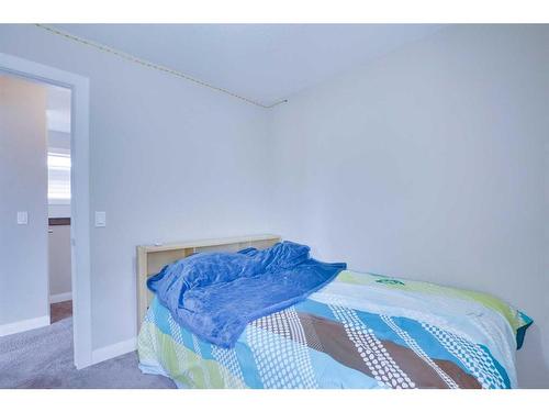 33 Redstone Villas Ne, Calgary, AB - Indoor Photo Showing Bedroom