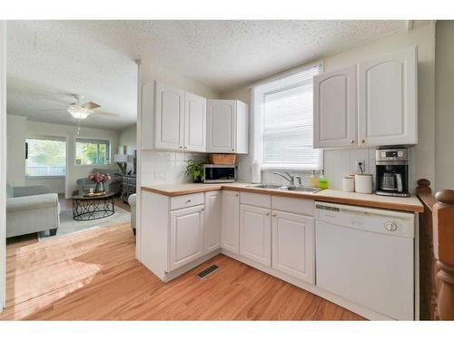 2304 22 Avenue Sw, Calgary, AB - Indoor Photo Showing Kitchen With Double Sink