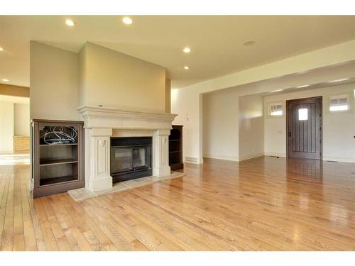 130 226 Avenue South, Calgary, AB - Indoor Photo Showing Living Room With Fireplace