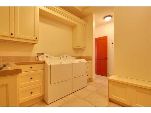 130 226 Avenue South, Calgary, AB - Indoor Photo Showing Laundry Room