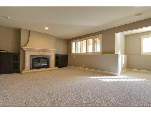 130 226 Avenue South, Calgary, AB - Indoor Photo Showing Other Room With Fireplace