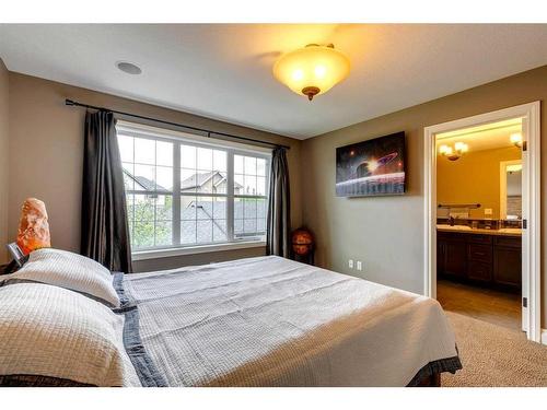 216 Quarry Park Boulevard Se, Calgary, AB - Indoor Photo Showing Bedroom