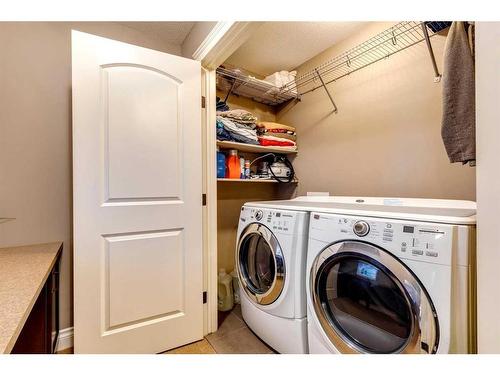 216 Quarry Park Boulevard Se, Calgary, AB - Indoor Photo Showing Laundry Room