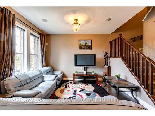 216 Quarry Park Boulevard Se, Calgary, AB - Indoor Photo Showing Living Room