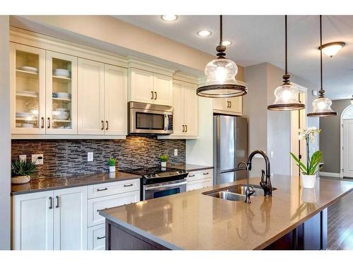 216 Quarry Park Boulevard Se, Calgary, AB - Indoor Photo Showing Kitchen With Double Sink With Upgraded Kitchen