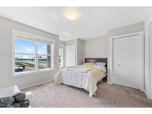 618 Cranford Mews Se, Calgary, AB - Indoor Photo Showing Bedroom