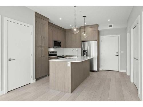 2304-681 Savanna Boulevard Ne, Calgary, AB - Indoor Photo Showing Kitchen