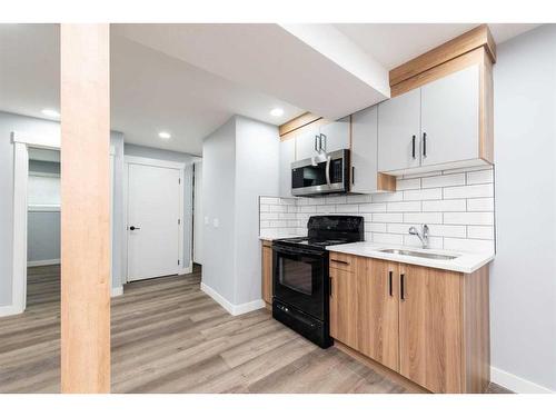 127 Saddlemont Crescent Ne, Calgary, AB - Indoor Photo Showing Kitchen