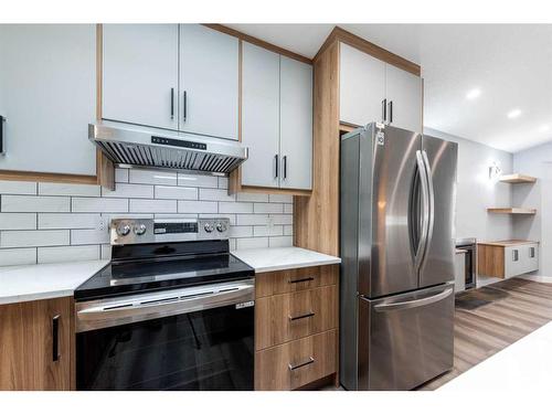 127 Saddlemont Crescent Ne, Calgary, AB - Indoor Photo Showing Kitchen